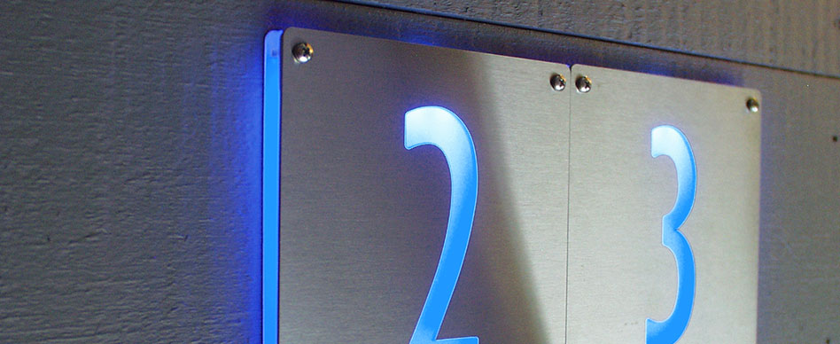 M-I-N-T ARCHITECTURAL ADDRESS NUMBERS & UNIT SIGNAGE
